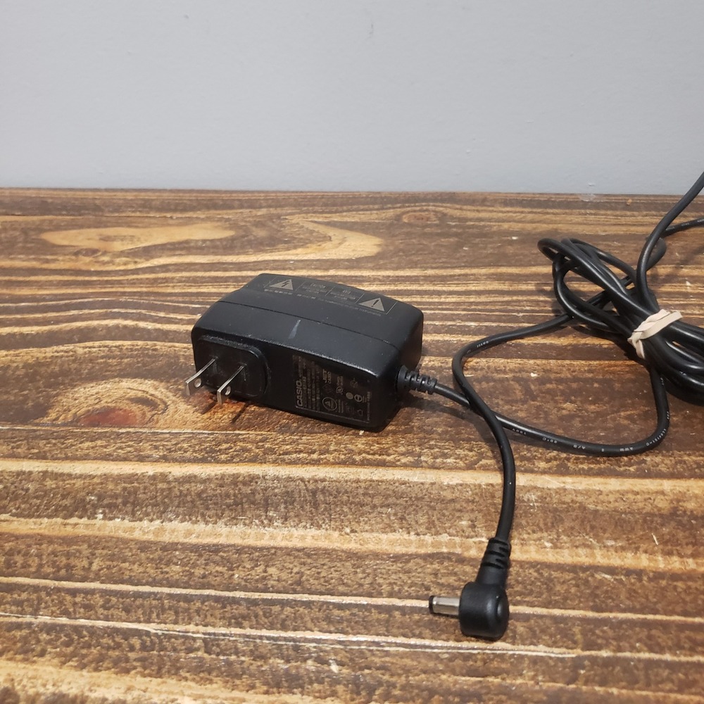 Casio keyboard AC Adaptor AD-E95100LU Black OEM Original 9.5V 1.0A Power Supply